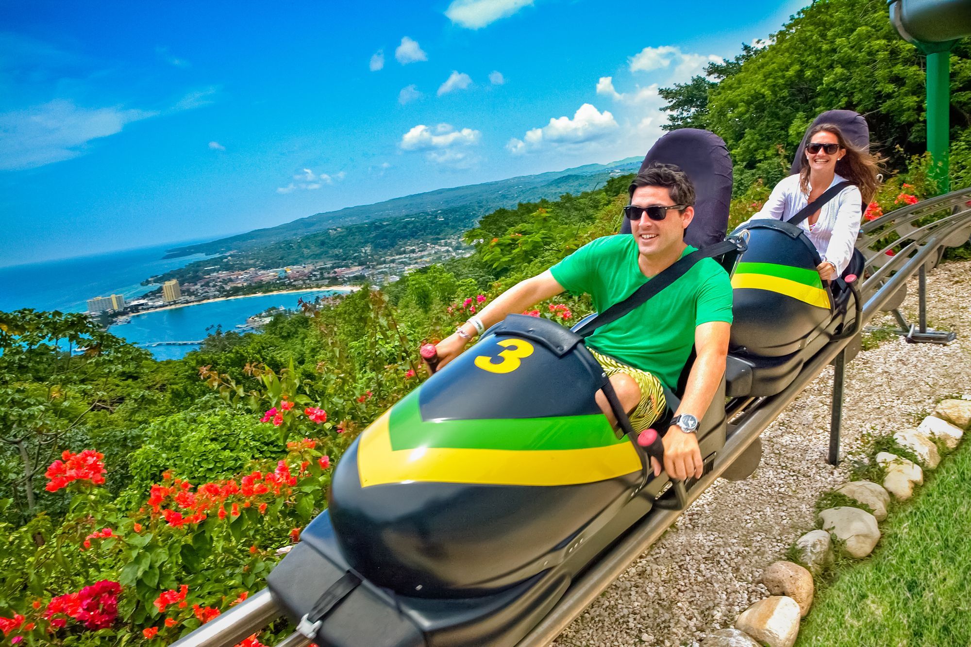 The Jamaican Bobsled ride at Mystic Mountain with the Ocho Rios coastline in the background, not photographed at the villa
